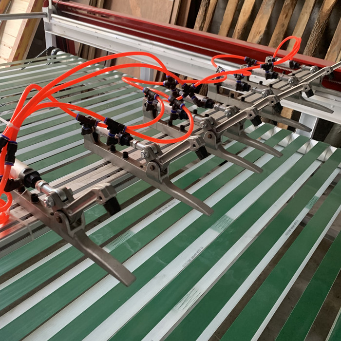 pulling and stacking device te kumea me te whakaputu taputapu