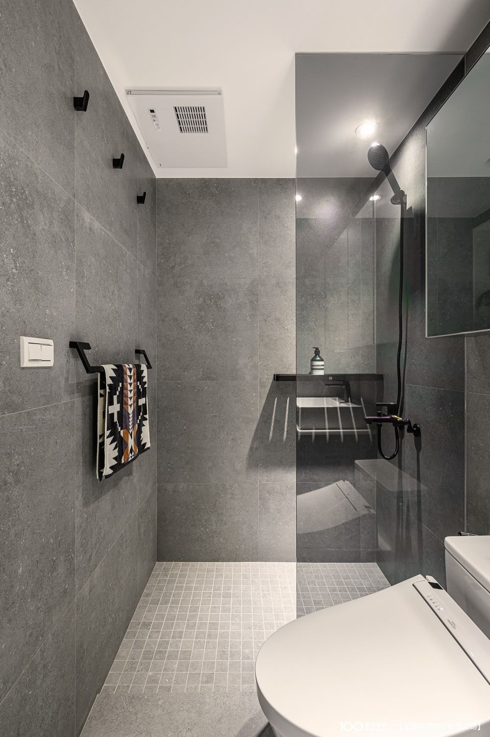Coated glass for bathroom glass and shower enclosures